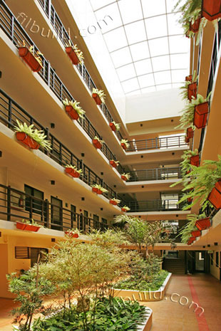 single-loaded corridors & landscaped atriums
